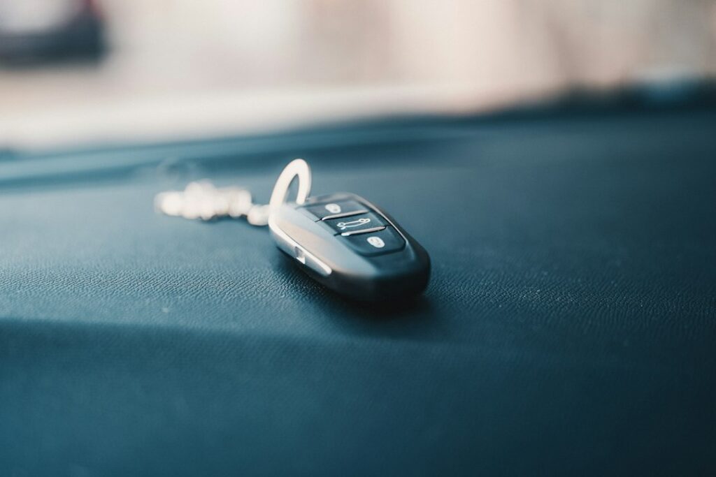 A black automotive key fob. Illustrative image, not a vehicle compatibility match.